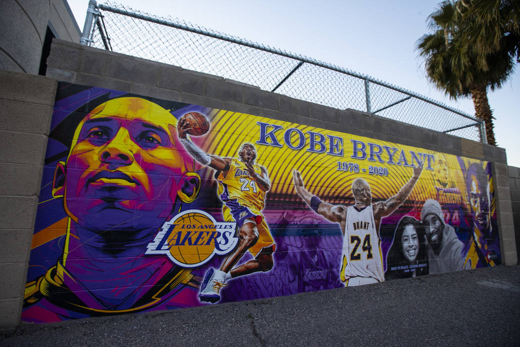 A mural featuring Kobe Bryant and daughter Gianna Bryant, created by Eric Meidenbauer, outside ...
