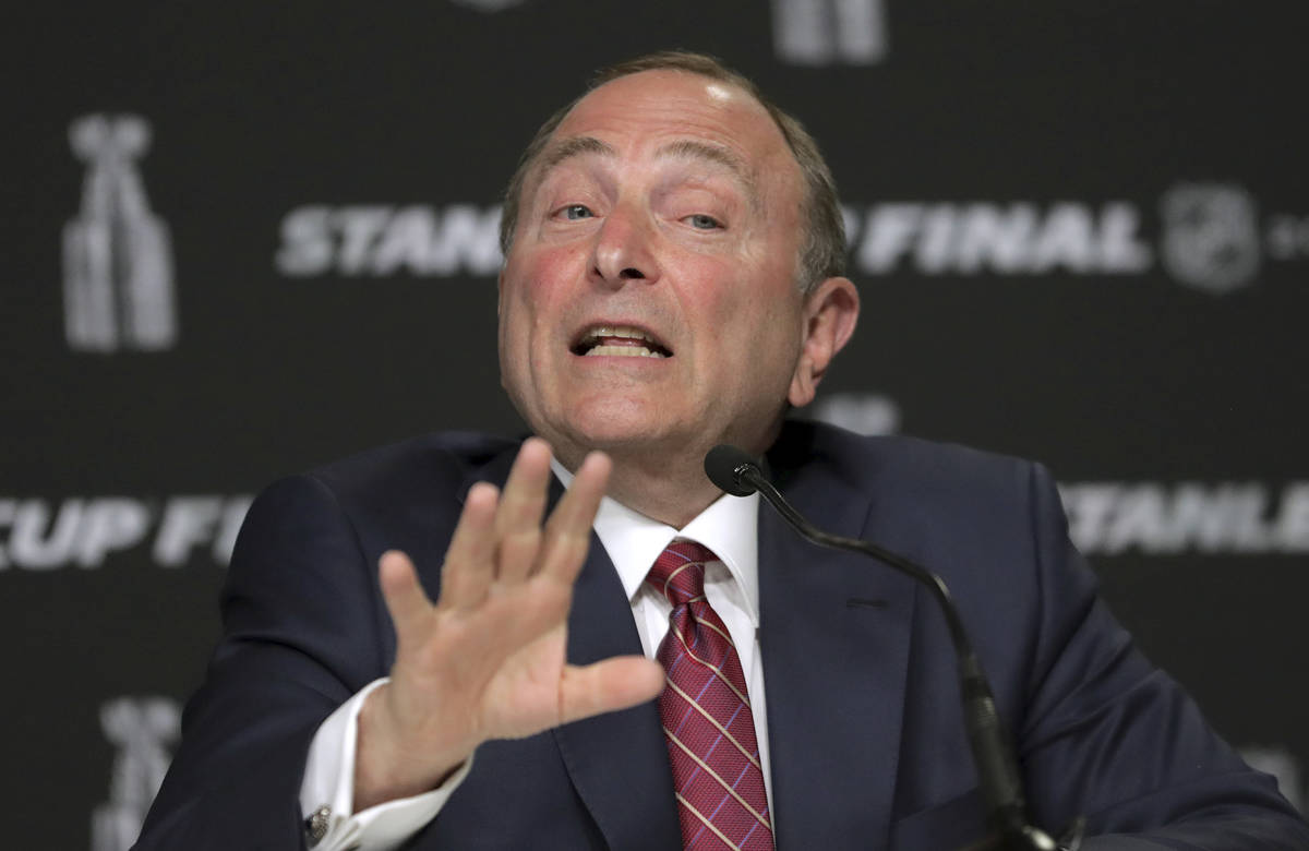 FILE - In this May 27, 2019, file photo, NHL Commissioner Gary Bettman speaks to the media befo ...