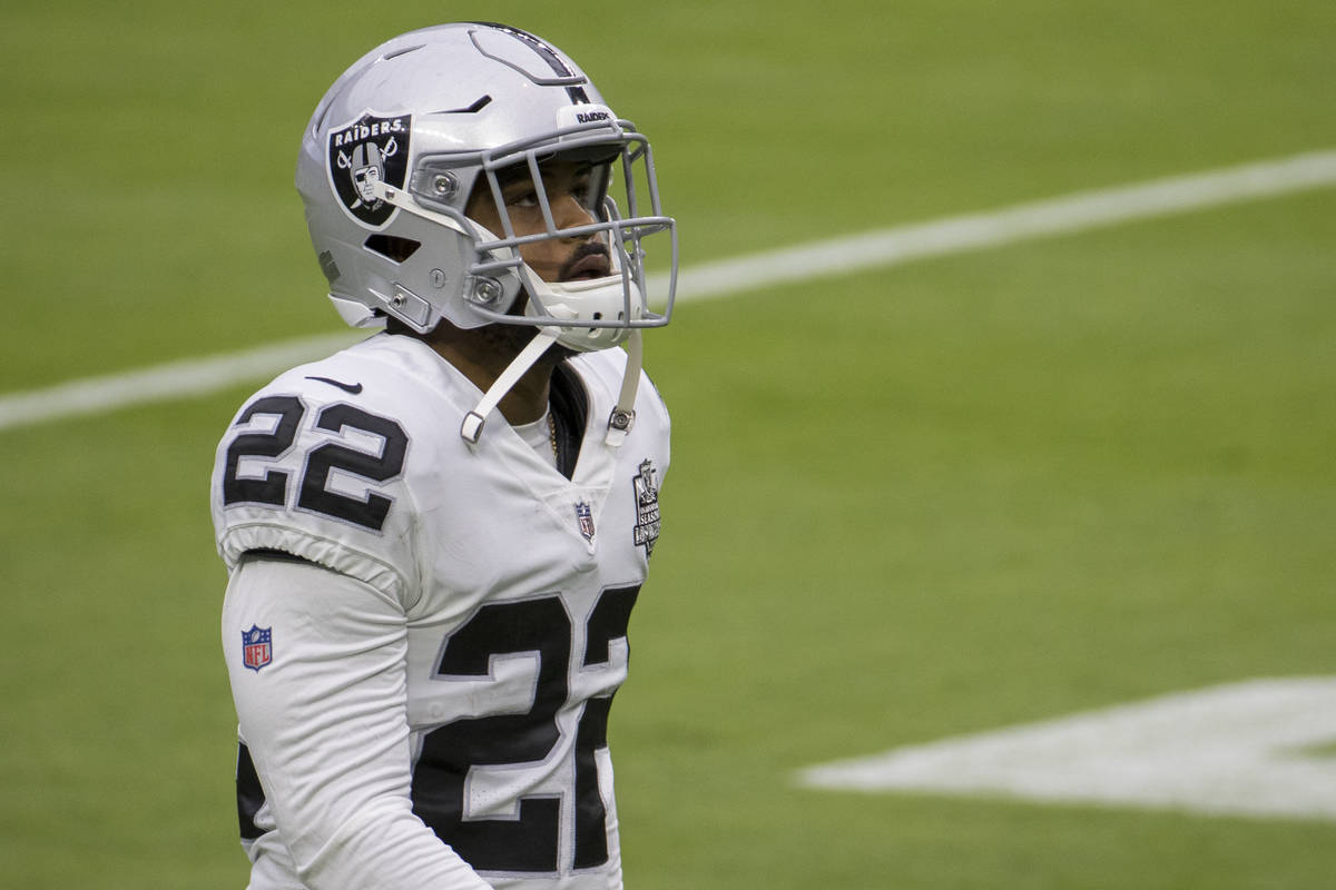 Las Vegas Raiders cornerback Keisean Nixon (22) walks up the field while warming up during a fo ...