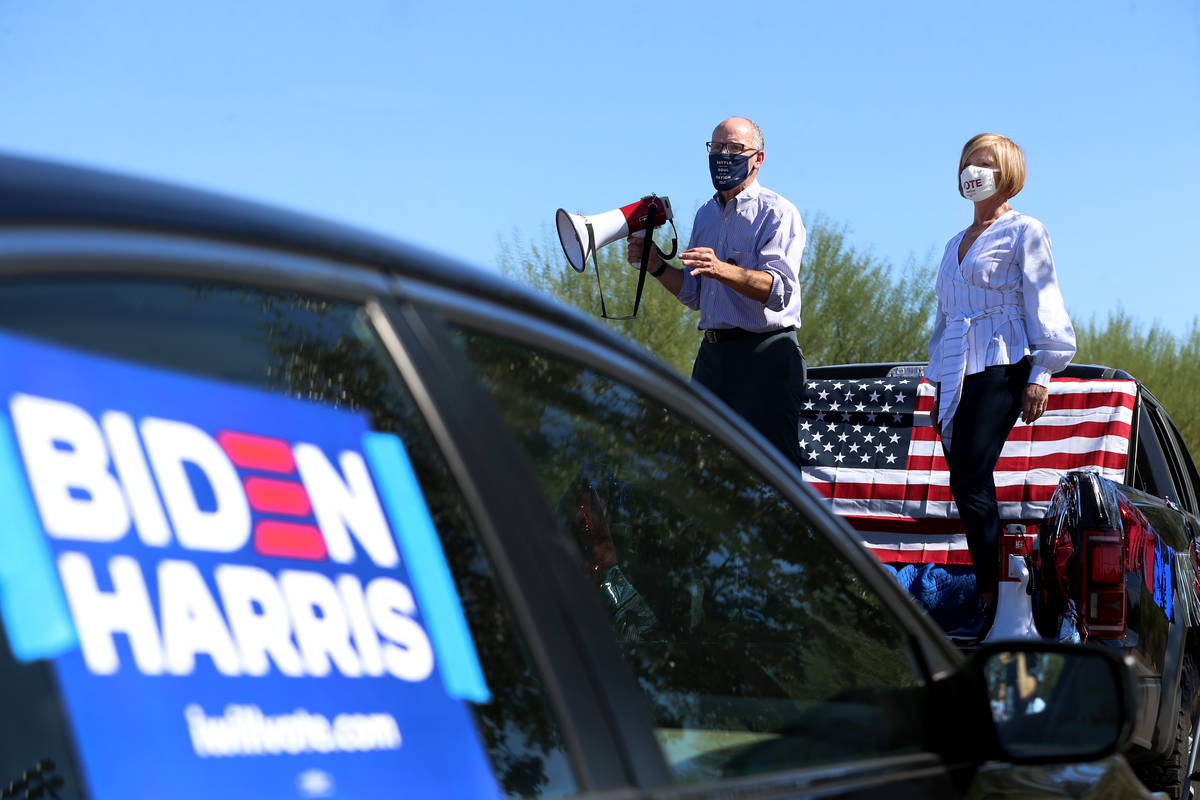 Democratic National Committee Chair Tom Perez, left, with U.S. Rep. Susie Lee, D-Nev., speaks ...