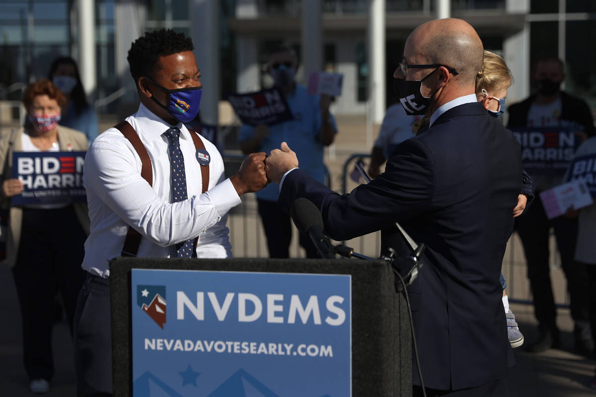 Las Vegas Councilman Brian Knudsen, right, with his daughter Kate, 2, introduces State Assembl ...