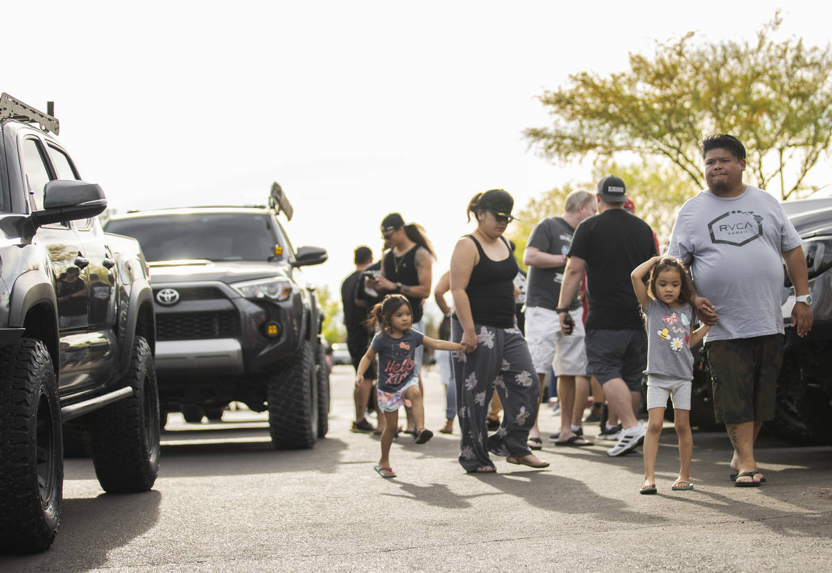 Members of Sin City Tundras wait to start a vehicle parade to support 9-year-old Aaliyah Velasq ...