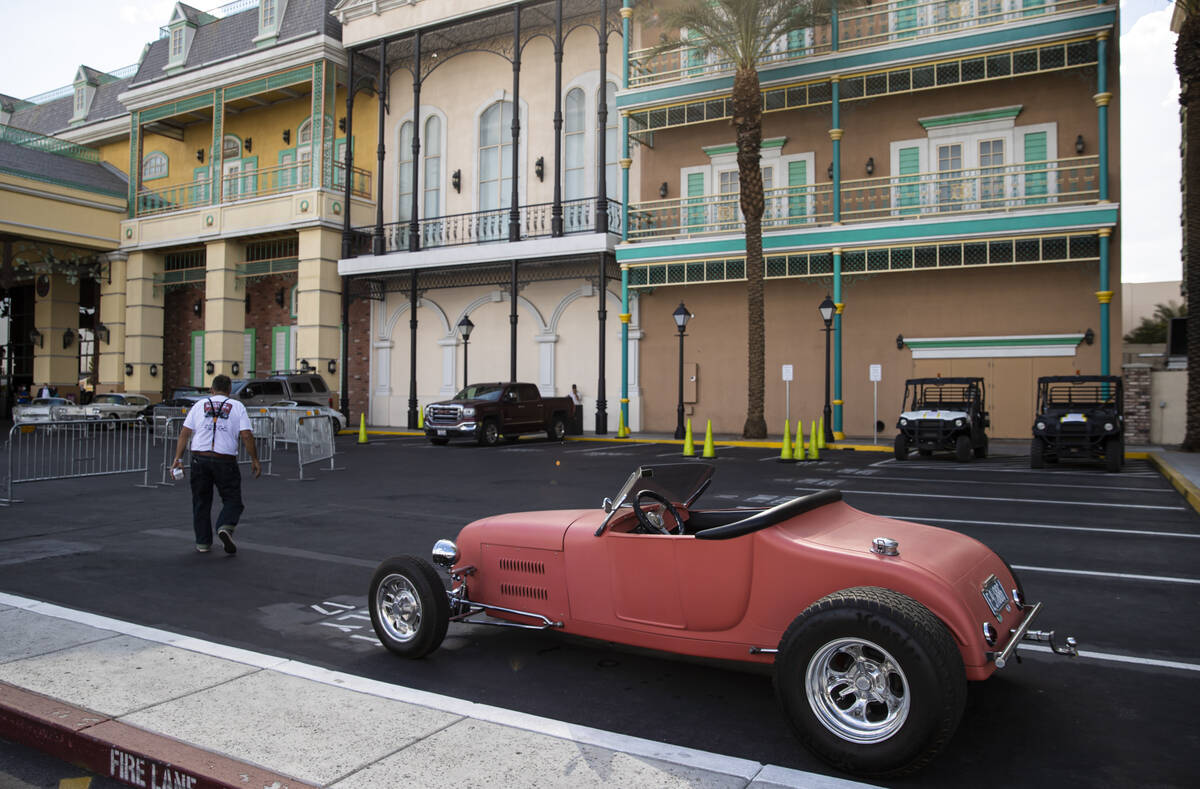 Rich Adkins, of Oakdale, Calif., walks after parking his 1926 Ford Track T during the first day ...