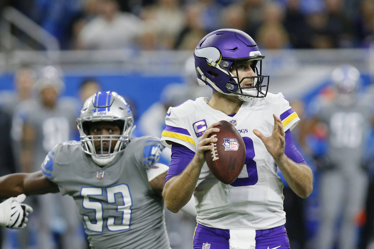 Detroit Lions outside linebacker Charles Harris (53) pressures Minnesota Vikings quarterback Ki ...