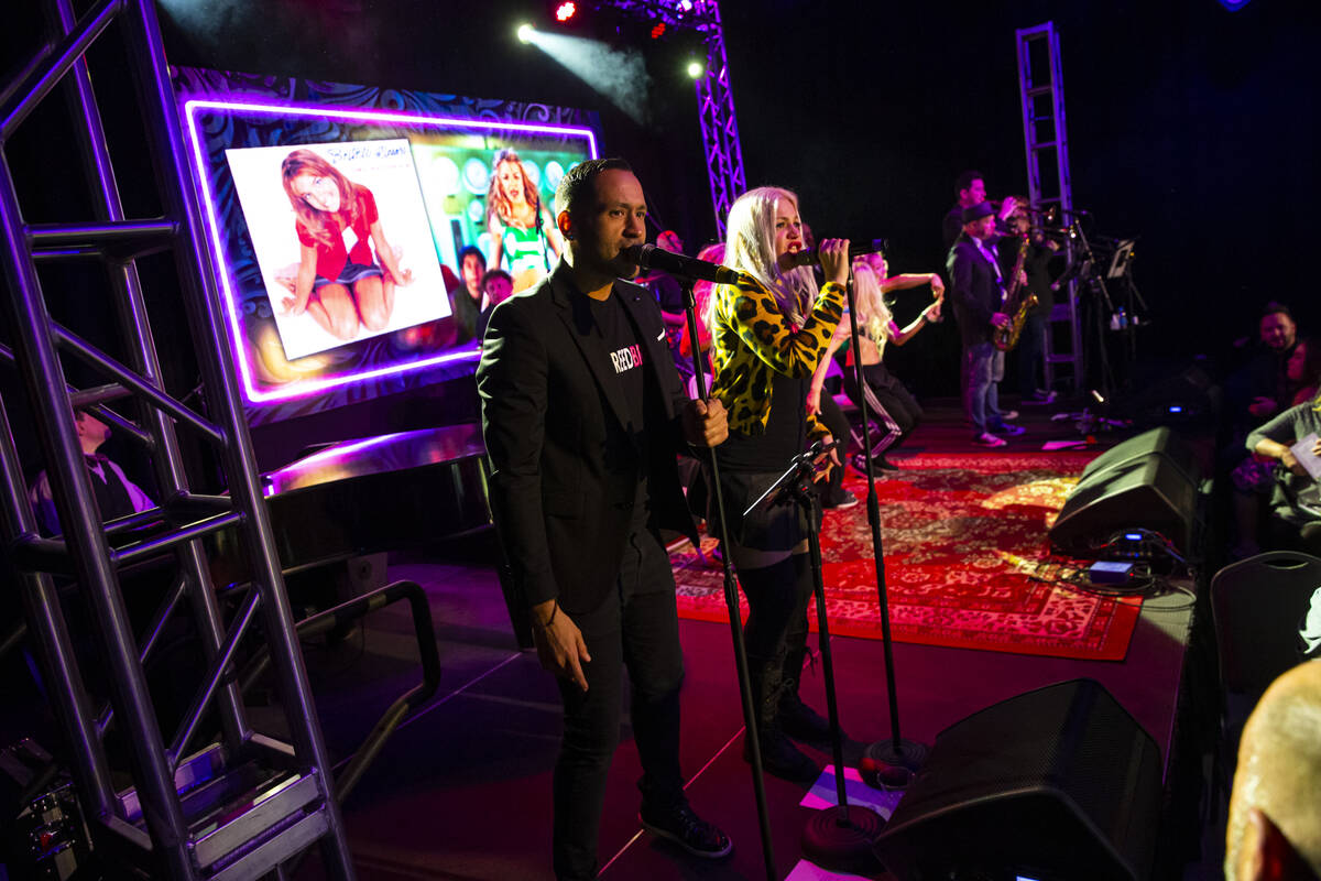 Justin Rodriguez, left, and Paige Strafella perform during a "Monday's Dark" show cel ...