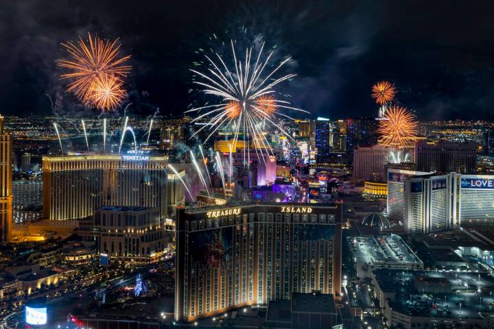 New Year’s Eve fireworks erupt above the Strip viewed from atop the Trump Tower on Sunda ...