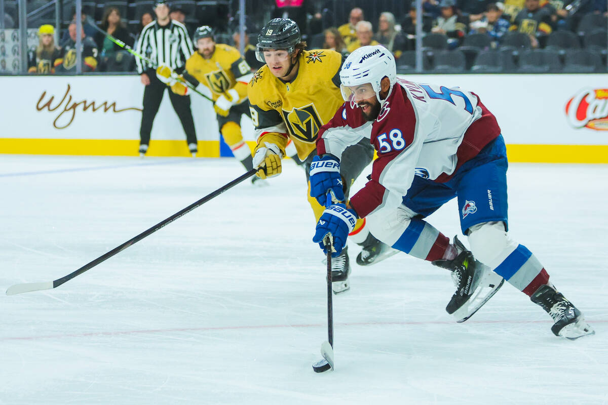 Golden Knights center Brendan Brisson (19) trails Colorado Avalanche defenseman Oliver Kylingto ...