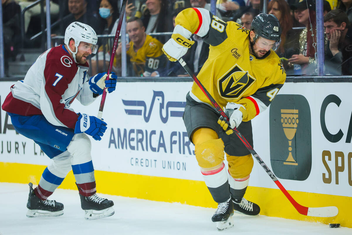 Golden Knights center Tomas Hertl (48) moves the puck out from behind the net while Colorado Av ...