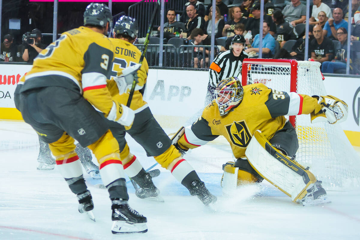 Golden Knights goalie Ilya Samsonov (35) makes a save during the second period of a preseason N ...