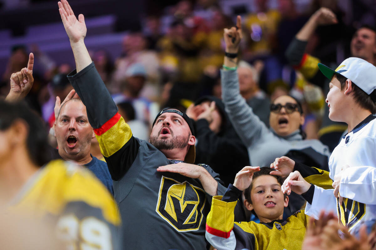 Golden Knights fans celebrate a goal during the second period of a preseason NHL hockey game be ...