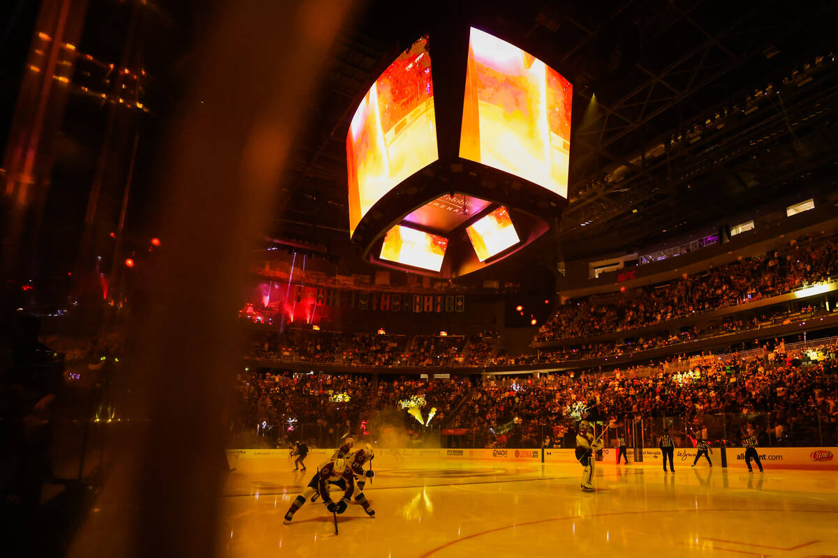 Colorado Avalanche players skae out at the beginning of a preseason NHL hockey game between the ...