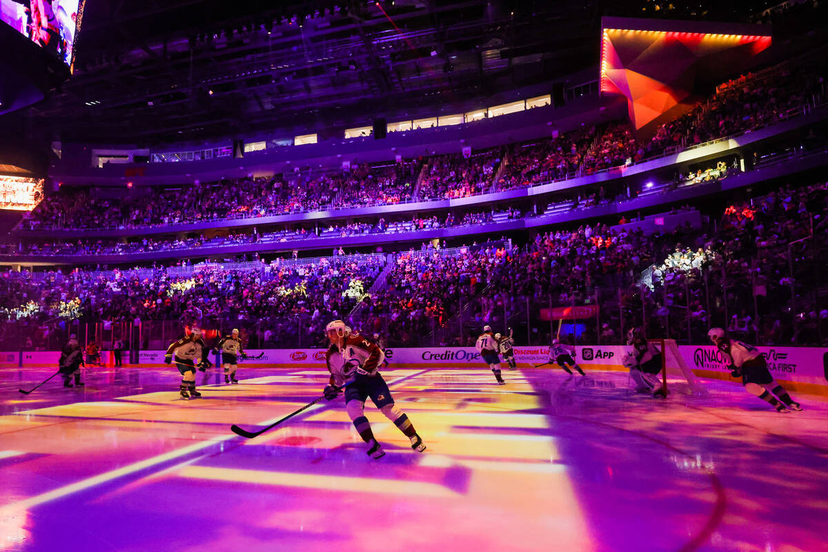 Colorado Avalanche players skae out at the beginning of a preseason NHL hockey game between the ...