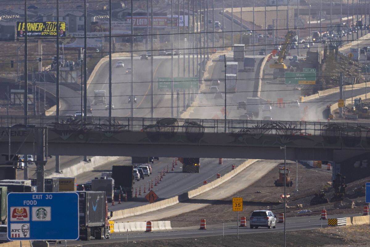 Traffic on Interstate 15 southbound is seen backed up as firefighters and the Nevada Highway Pa ...