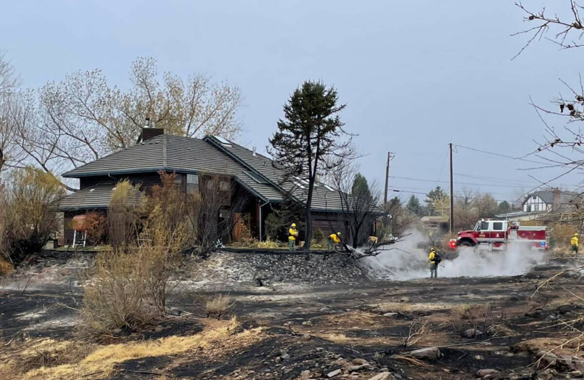 Fire crews battle the Callahan Fire, which caused the evacuations of hundreds of homes southwes ...