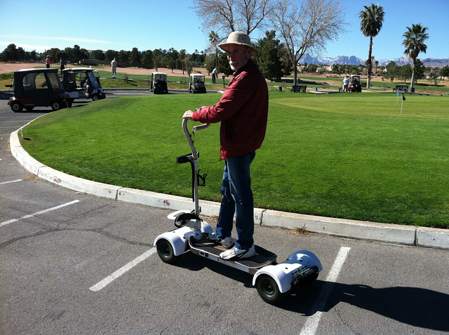 Sun City Summerlin resident Jerry Wilson models the GolfBoard on Feb. 25, 2015. (Special to View)