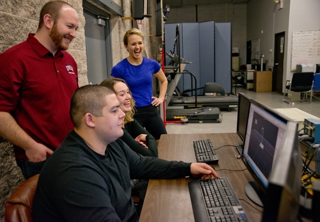 From left, Jeff Eggleston, John Harry, Kristy Wiegand and Sophia Bradley watch a video created with a motion capture system inside the Sports Injury Research Center at UNLV Jan. 22. Daniel Clark/L ...