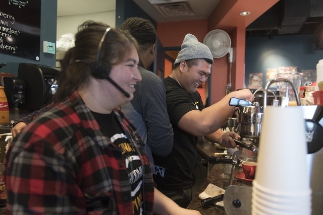 From left, Destiny Gray, Jay White and J.R. Rose prepare orders at Grouchy John's Coffee, 8520 S. Maryland Parkway, Feb. 5. Jason Ogulnik/Las Vegas Review-Journal