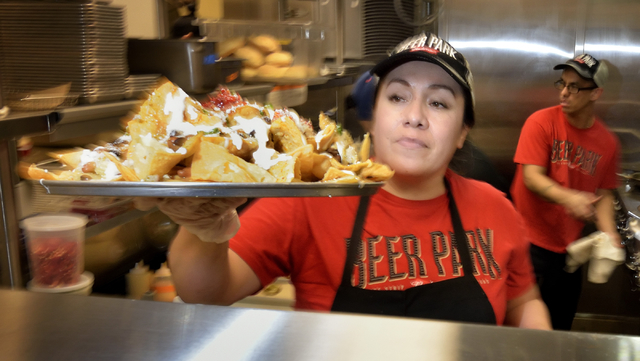 Cook Blanca Martinez puts an order up at the Beer Park in the Paris hotel-casino at 3655 Las Vegas Blvd. South in Las Vegas on Saturday, March 12, 2016. Bill Hughes/Las Vegas Review-Journal