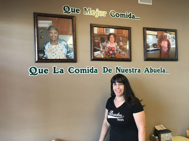 Leslie Valdes poses for a photo next to her grandmother, center, who inspired her to open Abuela's Tacos, 4225 E. Sahara Ave., in the midst of the recession. Sandy Lopez/View
