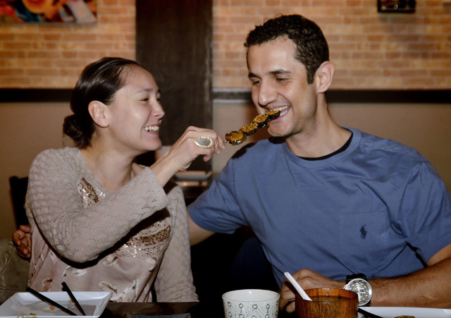 Erika and Charlie Abraham share an egg plant skewer at Inyo Asian Variety Restaurant at 6000 W. Spring Mountain Road in Las Vegas on Friday, March 4, 2016. Bill Hughes/Las Vegas Review-Journal