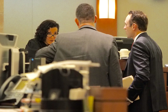 Judge Holly Stoberski listens to the prosecutor, center, and defense attorney Warren Geller, right, in the Jillian Lafave case at the Regional Justice Center in Las Vegas on Wednesday, March 30, 2 ...