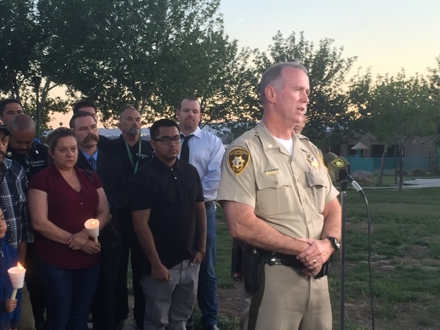 Deputy Chief Jim Owens addresses the media and vigil-goers at the scene where Angelo Barboza was killed and over 50 rounds were fired at Hollywood Park, near Hollywood Recreation Center on 1650 S  ...