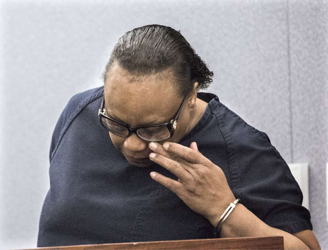 Brenda Stokes Wilson, convicted of killing a 10-year-old girl and slashing a Bellagio blackjack dealer, wipes tears during her sentencing at Regional Justice Center on Monday, May 16, 2016. She re ...