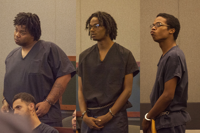 Ray Brown, left, Lee Murray Sykes and Lee Dominic Sykes, the three men accused of the killing of a Lee's Discount Liquor cashier during an armed robbery on April 18, 2016, appear at the Regional J ...