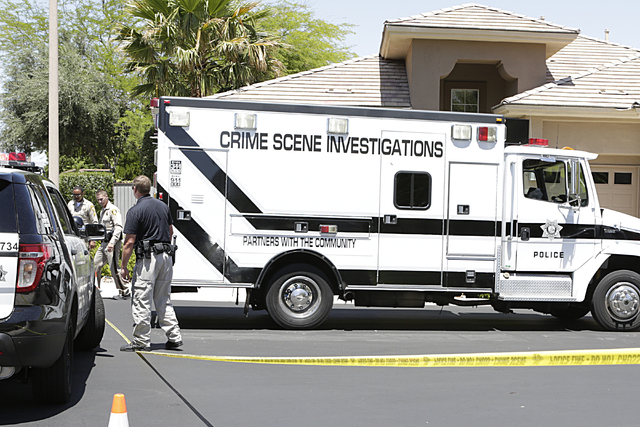 Metro's crime scene investigations truck arrives at the scene of an apparent double murder-suicide at 10301 Wood Owl Court, near Town Center Drive and Hualapai Way on Wednesday, June 1, 2016. Bizu ...