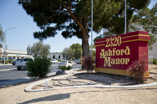 The front sign of Ashford Manor apartments near Smoke Ranch Road and Jones Boulevard is seen in Las Vegas on Saturday, June 4, 2016. A shooting took place in the early hours of Saturday morning ne ...