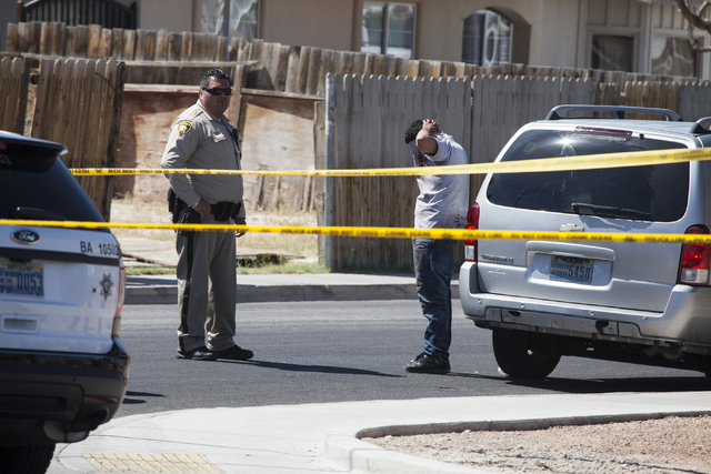 The scene of a shooting near Tonopah Drive and Washington Avenue is seen on Wednesday, June 1, 2016, in Las Vegas. Loren Townsley/Las Vegas Review-Journal Follow @lorentownsley