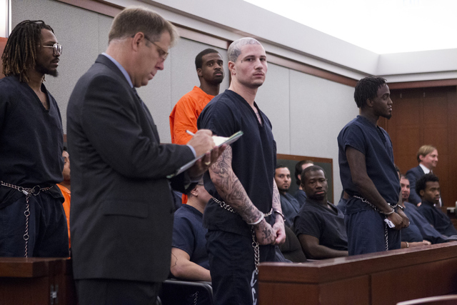 Four men charged in the 2009 shooting death of 16-year-old Aric Brill, from left, Arthur Moore, Davon Sebastian Phillips, Nadin Hiko and Devonte Wash, appear in their court hearing at the Regional ...
