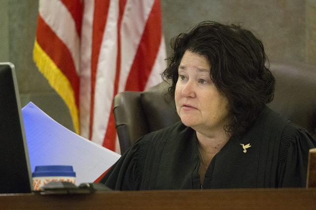 District Judge Elizabeth Gonzalez speaks during the first court appearance for four men charged in the 2009 shooting death of 16-year-old Aric Brill at the Regional Justice Center on Wednesday, Ju ...