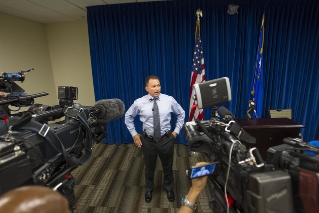 Metro Lt. Laz Chavez briefs members of the news media at Metro headquarters in Las Vegas on Wednesday, July 13, 2016, on the murder case of 16-year-old Aric Brill, who was shot and killed outside  ...