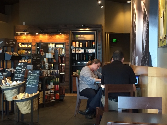 Patrons are seen inside Starbucks at 7260 S. Rainbow Blvd. in Las Vegas on Tuesday, Sept. 27, 2016. A fatal shooting broke out inside the coffee shop on Sunday, Sept. 25, 2016. Raven Jackson /Las  ...