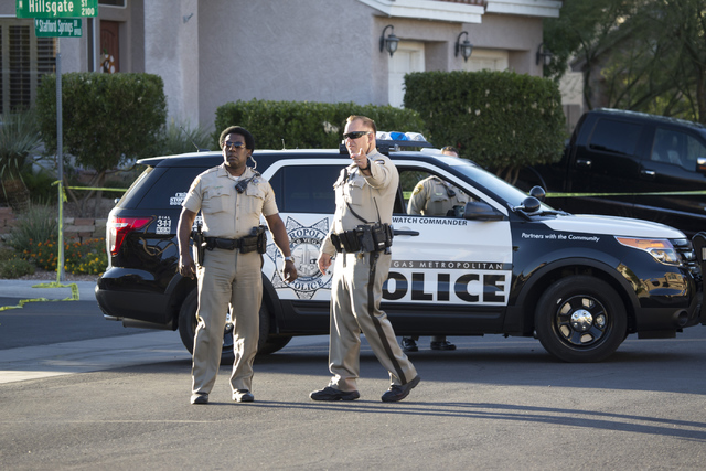 The scene near a shooting is seen at the intersection of Hillsgate Street and Staffords Spring Drive on Tuesday, Oct. 4, 2016, in Las Vegas. (Erik Verduzco/Las Vegas Review-Journal) Follow @Erik_V ...