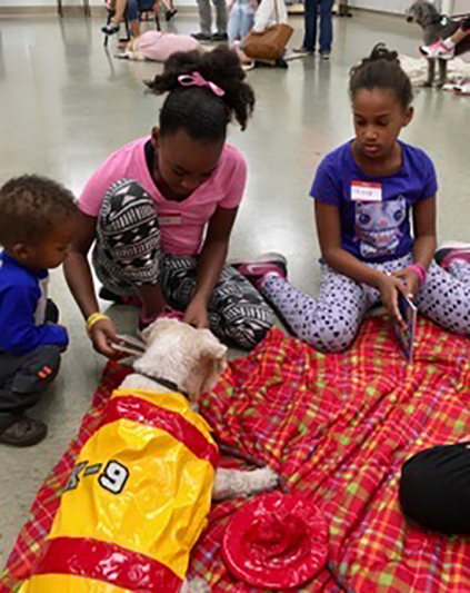 Attendees included adults, children and therapy dogs in costume during the Oct. 8, 2016, Reading with Rascal at Desert Spring United Methodist Church. Special to View