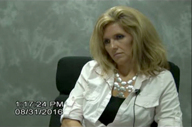 During a deposition on Aug. 31, 2016, Rhonda Borgia answers questions regarding her investigation into the death of attorney Susan Winters. (Courtesy video screen capture)
