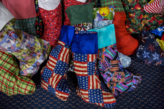 Stockings to be sent to active troops overseas filled by students from Gordon McCaw Elementary School are pictured during the 8th annual &quot;Stockings for our Troops,&quot; at Henderson  ...