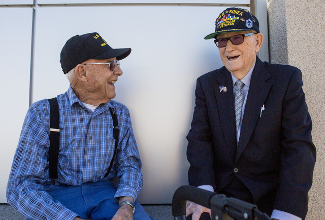 Les Burgwardt, left, a WWII and Korea Veteran, left, and Chester Swafford, a WWII, Korea and Vietnam veteran, old friends and neighbors reunite in Henderson on Saturday. (Elizabeth Page Brumley/La ...