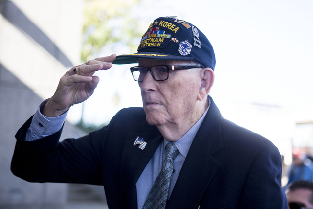 Chester Swafford, a WWII, Korea and Vietnam veteran, stands with other veterans at the Henderson Events Plaza amphitheater Saturday morning, Nov. 5, 2016. Elizabeth Page Brumley/Las Vegas Review-J ...