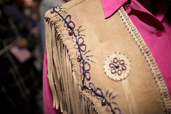 Mary Novak shows off her leather pancho at the National Finals Rodeo at Thomas & Mack Cente ...