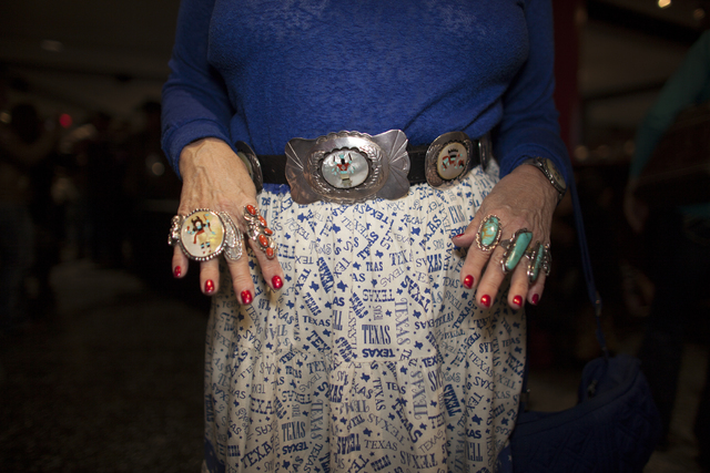 Sandy Bush shows off her rings and belt at the National Finals Rodeo at Thomas & Mack Cente ...