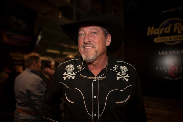 Greg McKinney shows off his skull and crossbones shirt at the National Finals Rodeo at Thomas & ...
