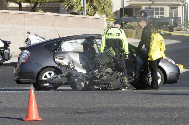 Henderson police investigate a fatal crash involving a motorcycle and car at Sun City Anthem Drive and Thunder Bay Avenue in Henderson, Tuesday, Dec. 6, 2016. (Bizuayehu Tesfaye/Las Vegas Review-J ...