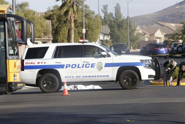 Henderson police investigate a fatal crash involving a motorcycle and car at Sun City Anthem Drive and Thunder Bay Avenue in Henderson, Tuesday, Dec. 6, 2016. (Bizuayehu Tesfaye/Las Vegas Review-J ...