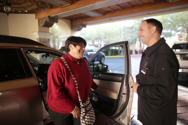 Colin Shaughnessy helps Angela Hori get out of her car at Green Valley Ranch Resort on Tuesday, Dec. 27, 2016, in Henderson. Shaughnessy has worked as a valet there for 15 years. (Rachel Aston/Vie ...