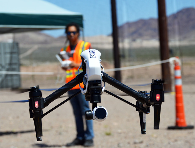 Mark Belizario films the Aerodrome port in Eldorado Valley using his DJI Inspire drone. The unmanned aerial vehicle is equipped with a high-tech 1,800 megapixel camera. Max Lancaster/Boulder City  ...