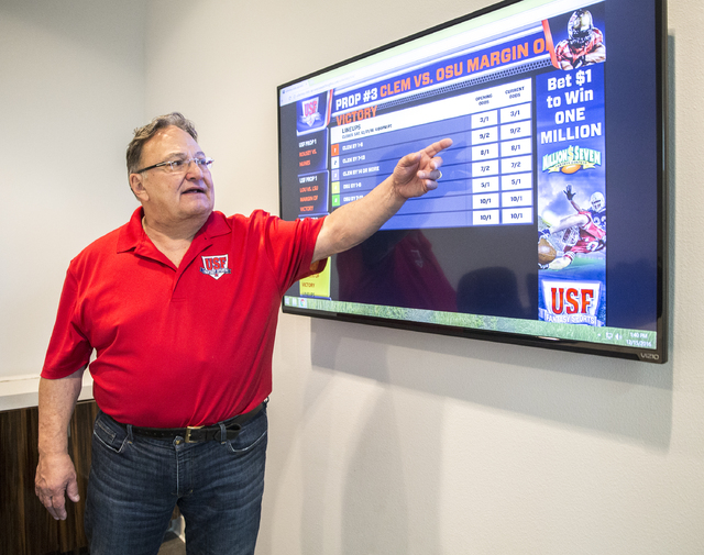 US Fantasy president Vic Salerno explains the function of a video display board showing current betting odds on Thursday, Dec. 15, 2016, at US Fantasy, in Las Vegas. Benjamin Hager/Las Vegas Revie ...