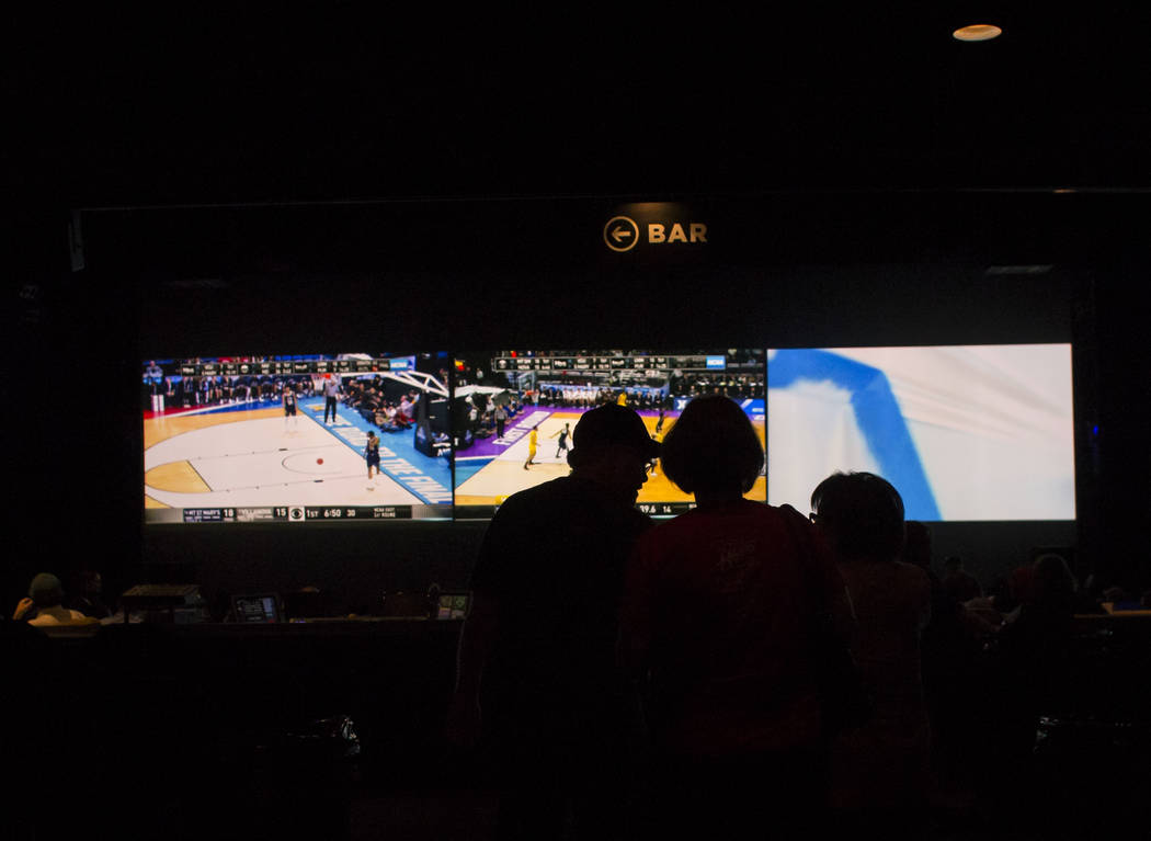 Basketball fans arrive at the International Westgate Theater to take in the action from the first day of the NCAA basketball tournament in Las Vegas on Thursday, March 16, 2017. (Chase Stevens/Las ...